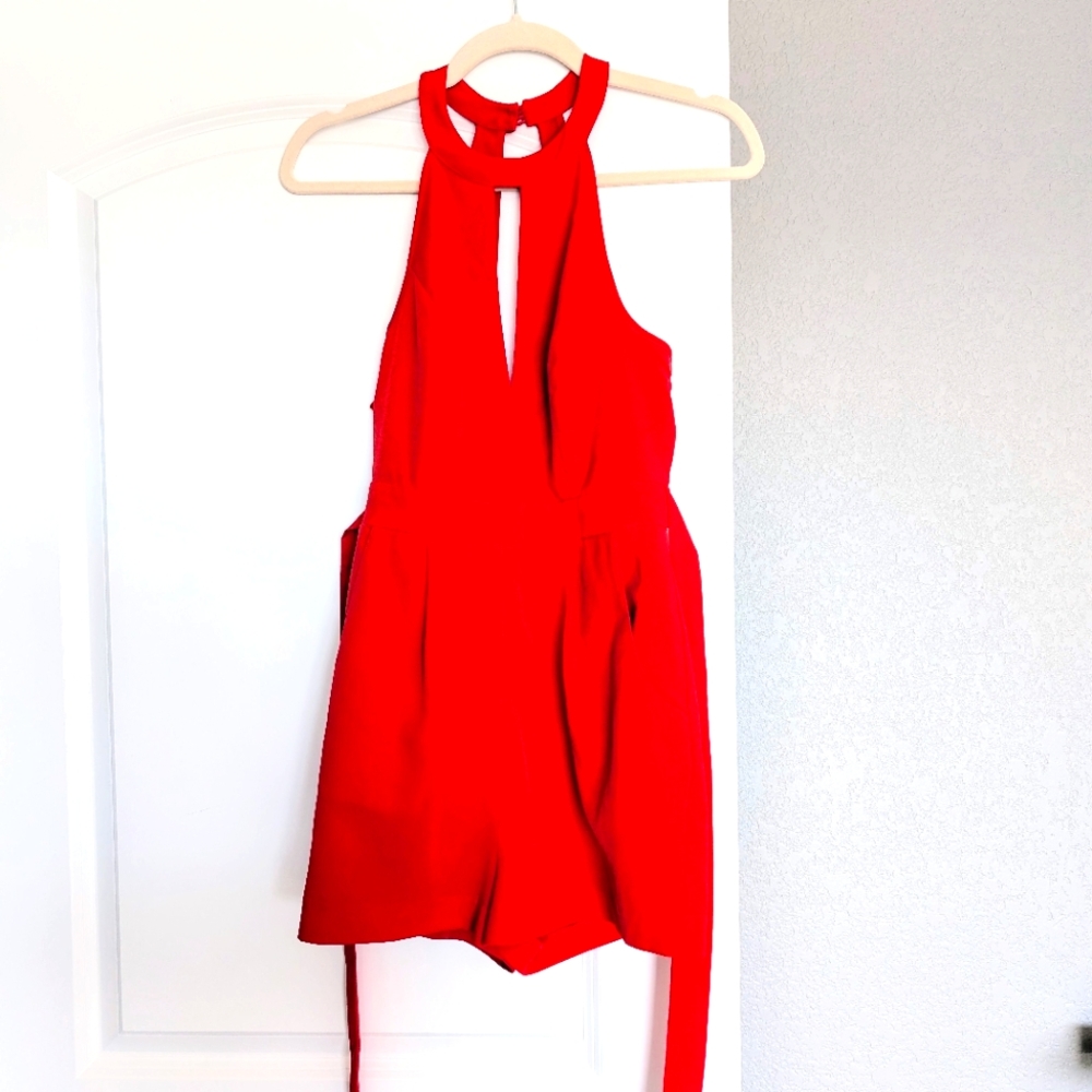 Bebe Open Back Romper in Red, Size XSmall